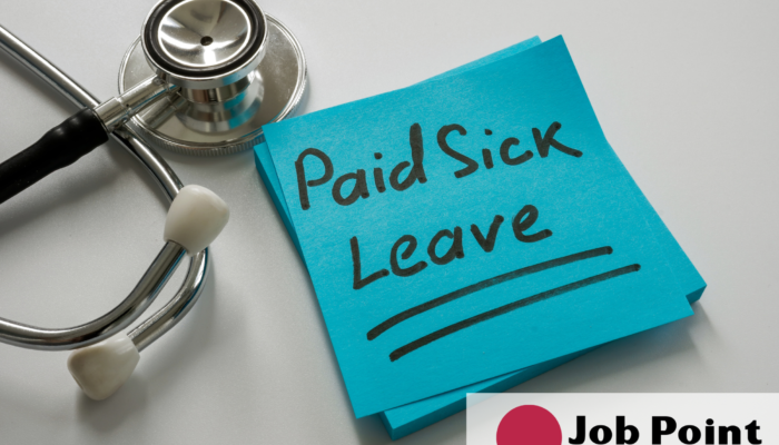 stetoskop i niebieska kartka z napisem paid sick leave